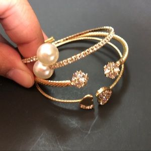 Bebe NWT gold three bracelet set